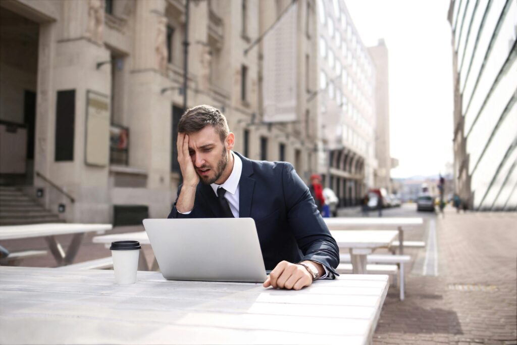 Photo by Andrea Piacquadio: https://www.pexels.com/photo/man-in-black-suit-covering-his-face-with-right-hand-3777554/